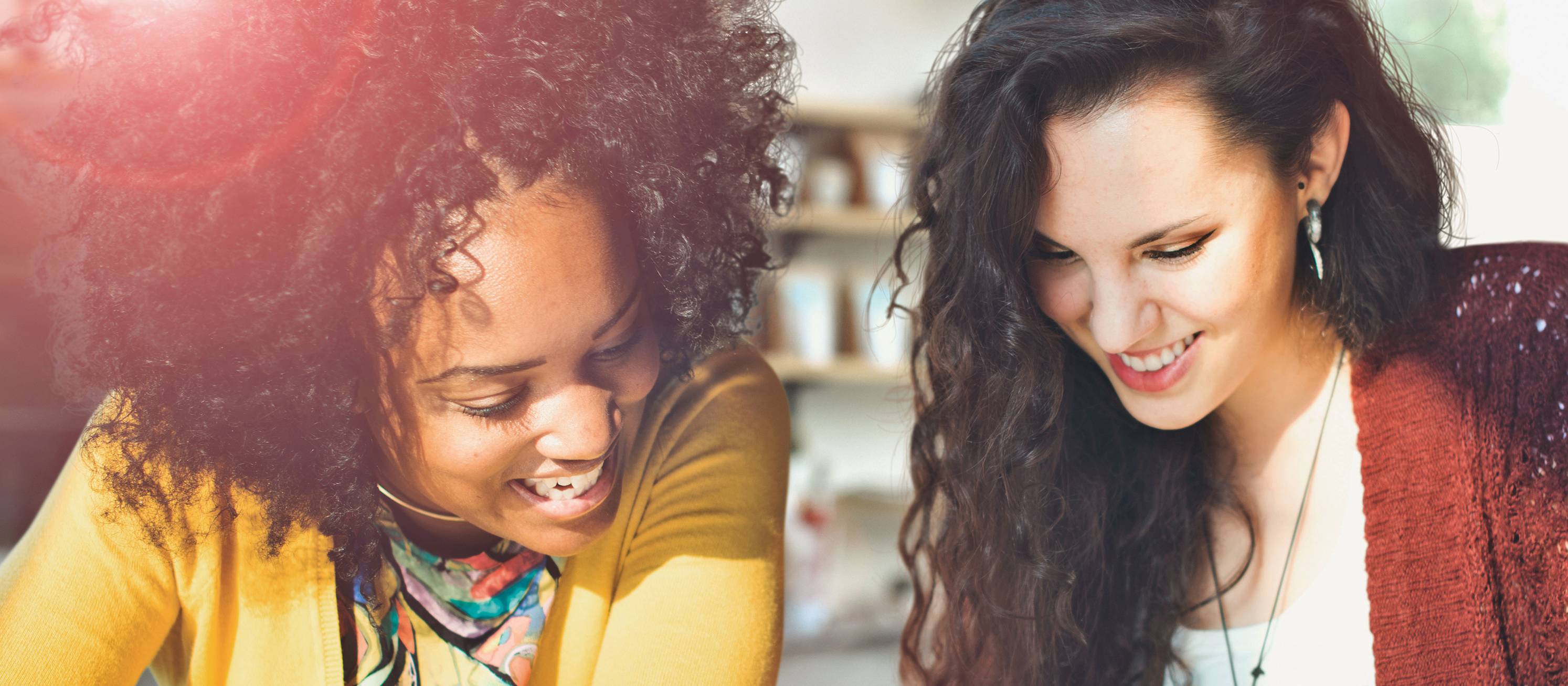 Two master students in Tourism and Change are smiling