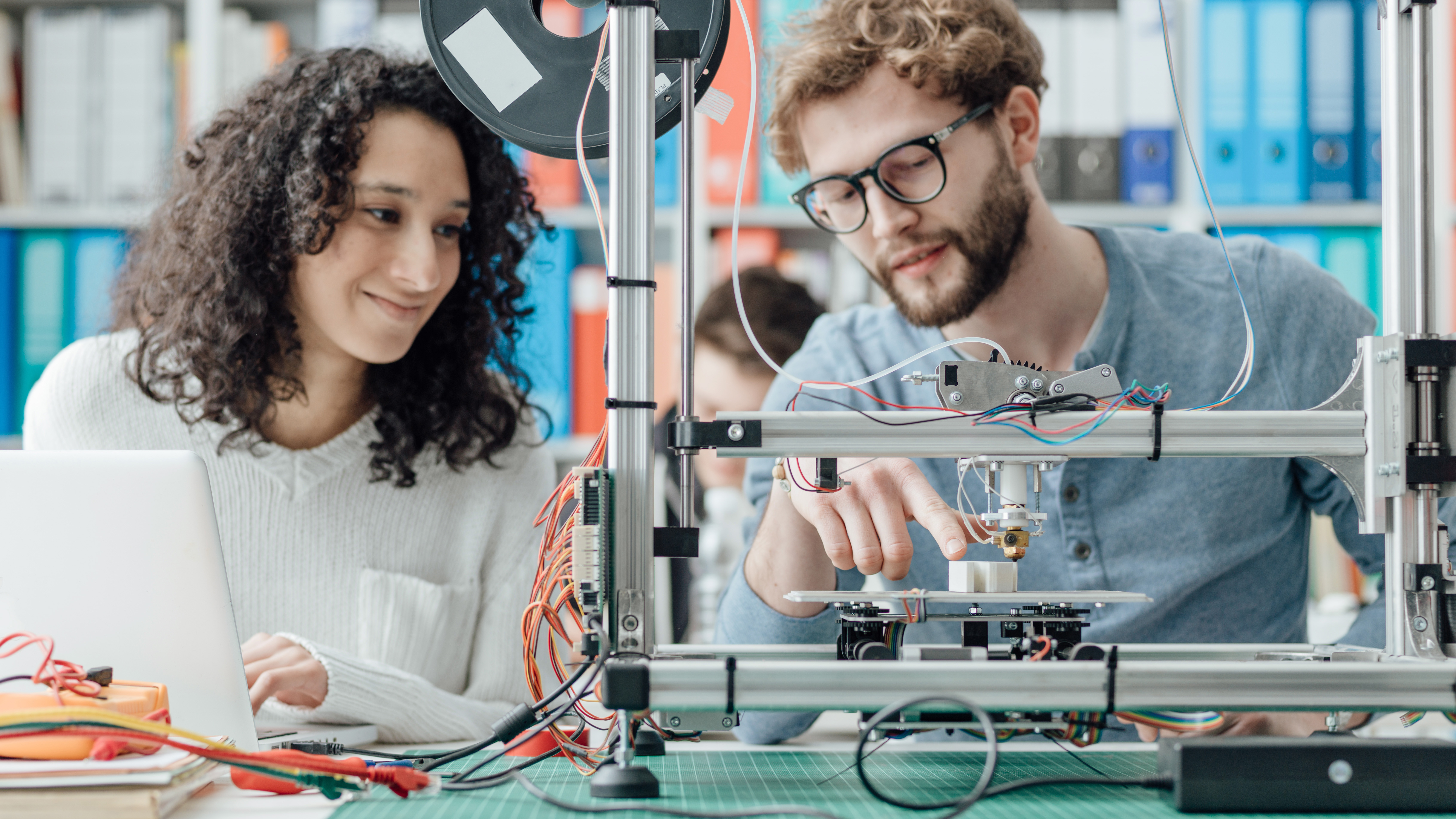 Engineering,Students,Using,A,3d,Printer,In,The,Laboratory,,They